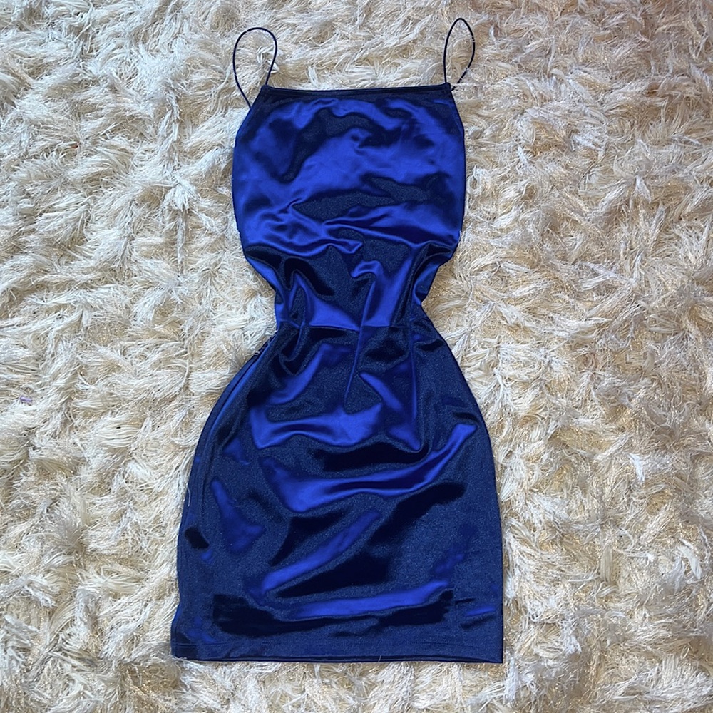 Dark blue tight fitted mini dress with open back